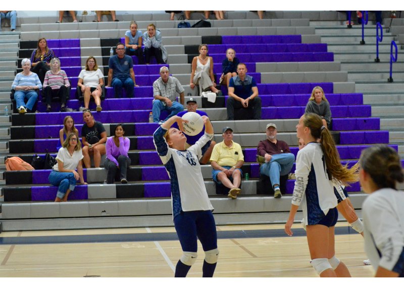 Sussex Academy sophomore Jopie Smith sets the ball.
